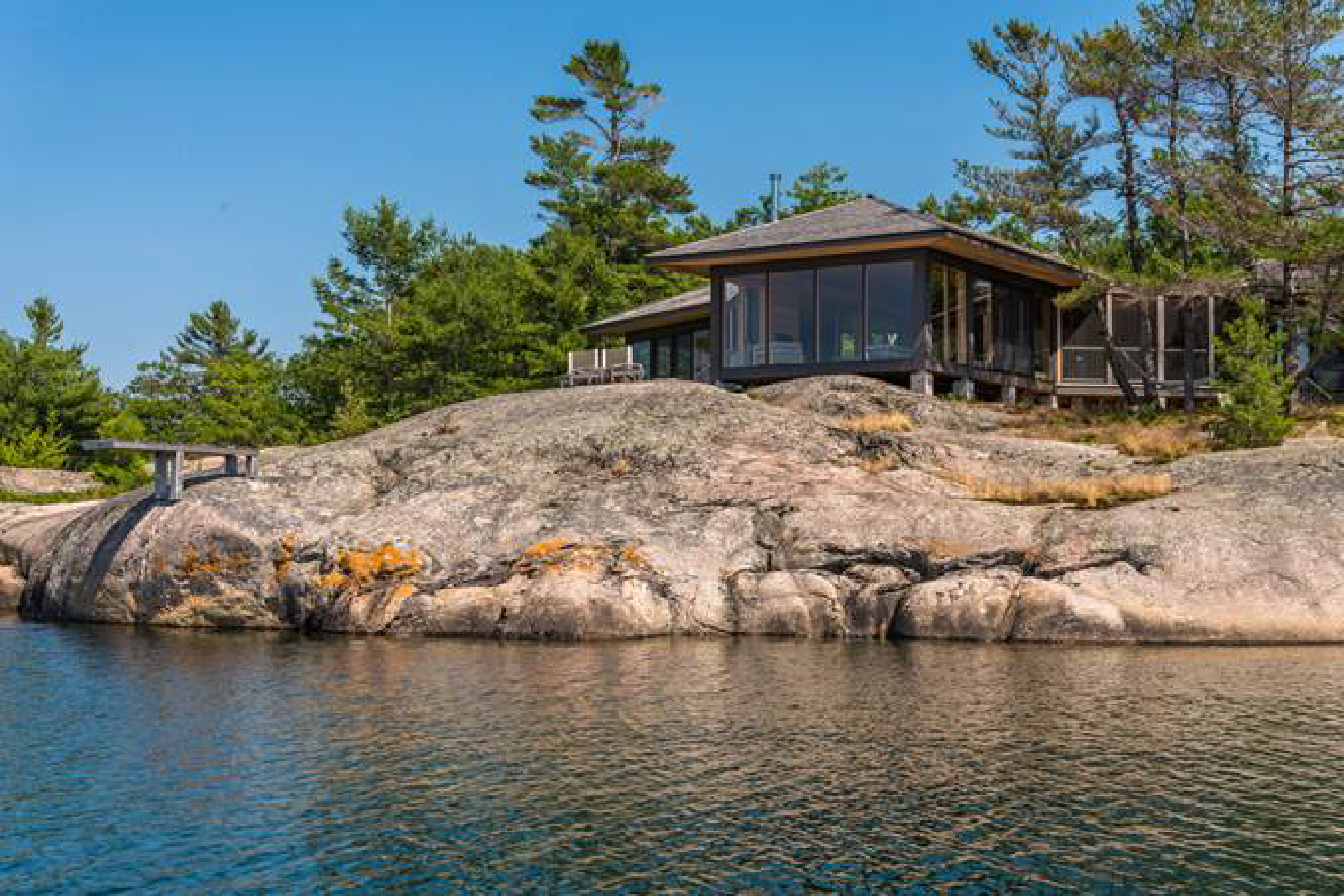 Exterior of Building on Cliff Beside Water